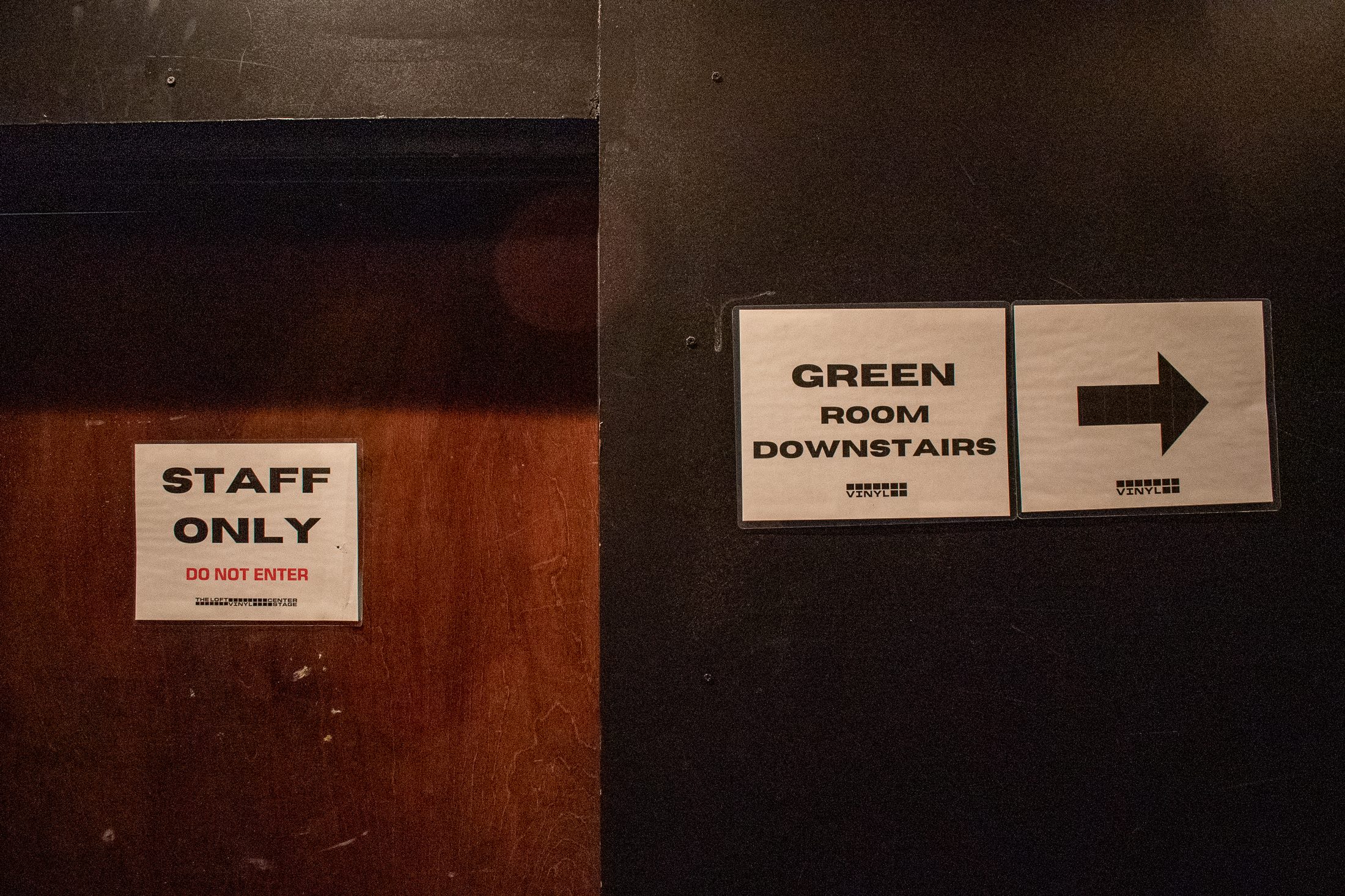 Signs leading to the Green Room where the artists hang out and keep their valuables when they aren’t on stage.